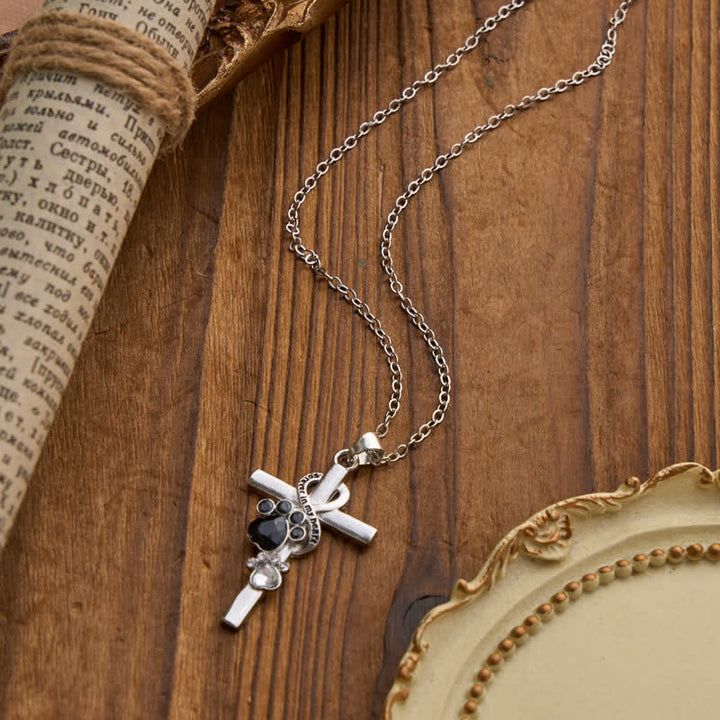 Christianartworkshop Collana con croce commemorativa in lega con impronta di zampa: emblema di tenero ricordo celeste - image 1