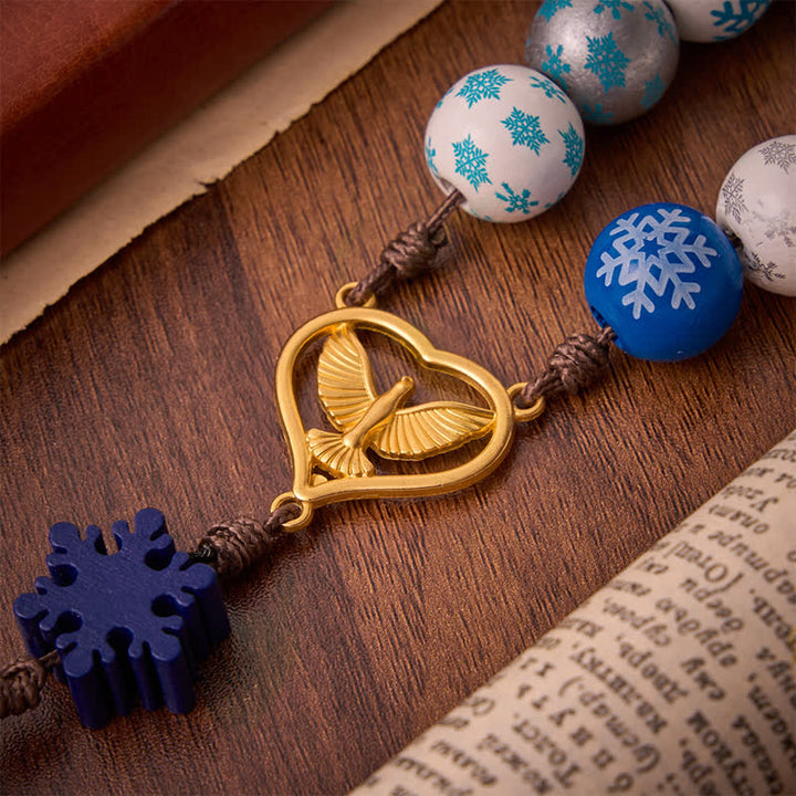 Christianartworkshop Rosario con perline di legno a forma di fiocco di neve e medaglia a forma di cuore dello Spirito Santo: emblema di pura serenità celeste. - image 7
